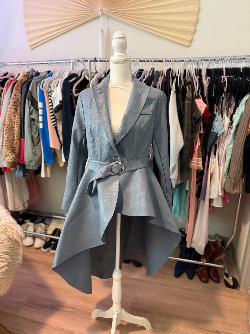 For her brand peplum style coat